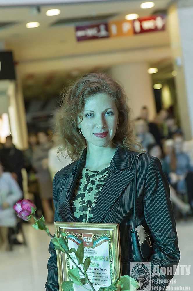 Дизайнер Л. Розумная